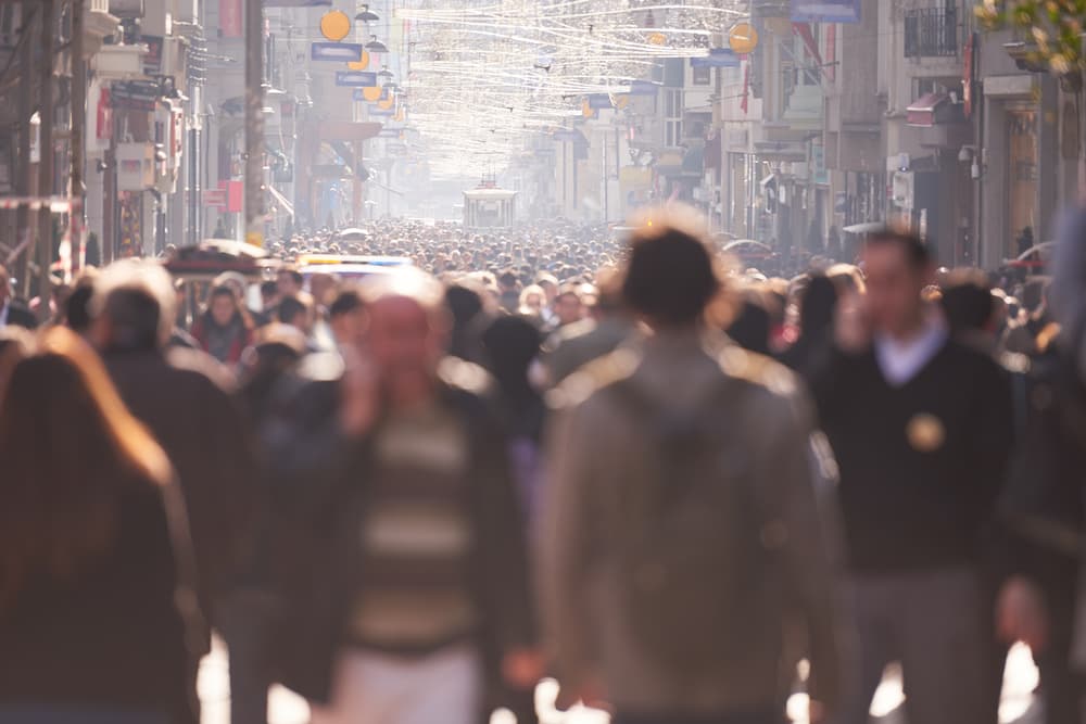 Long shot of a busy street full of people