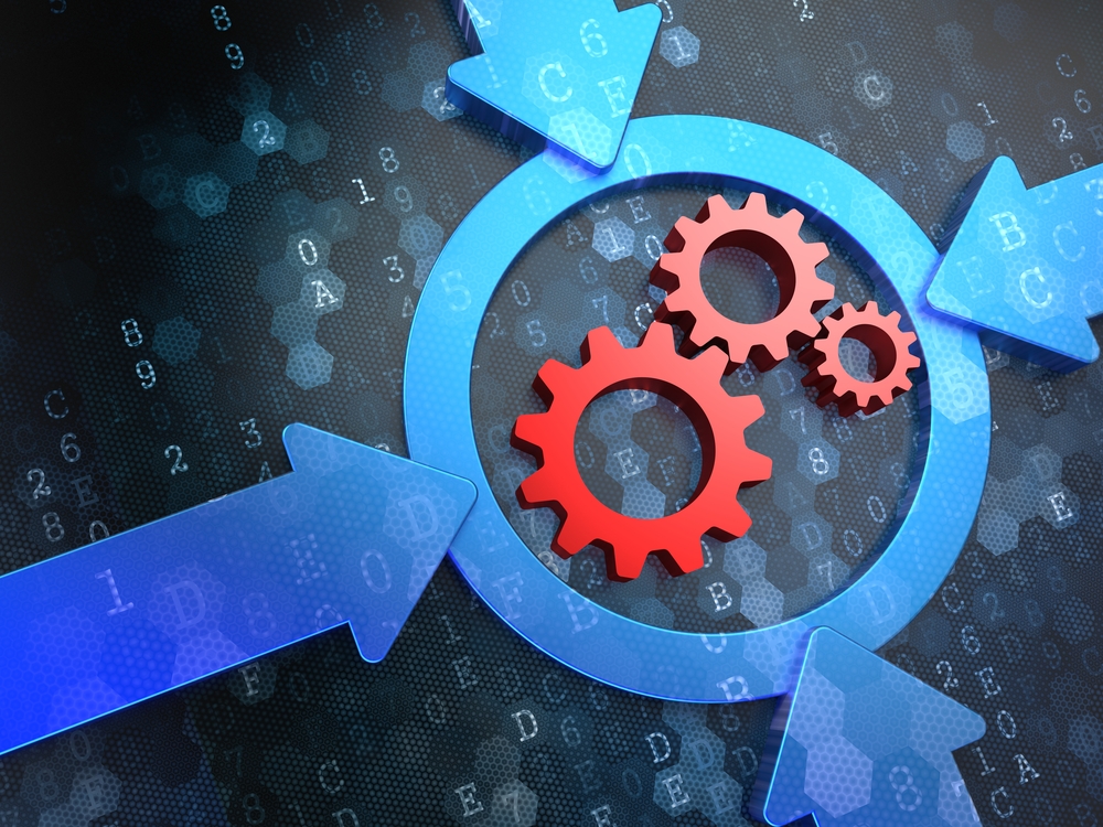 Arrows pointing at gears located inside of a circle