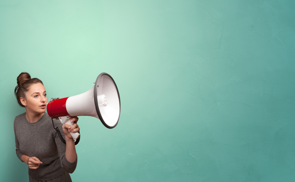 A woman holding a megaphone