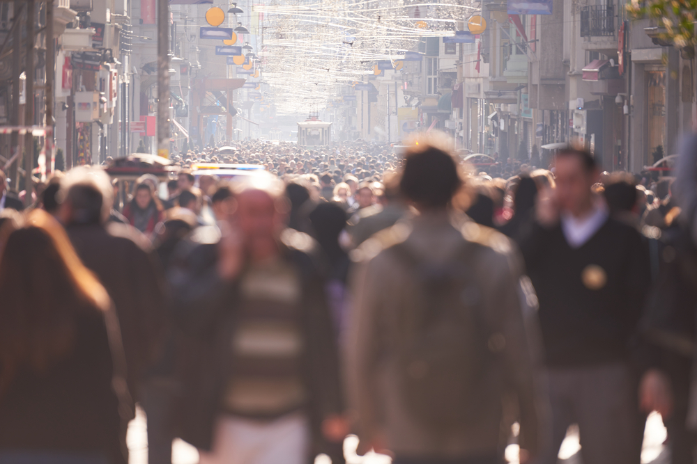 Long shot of a busy street full of people
